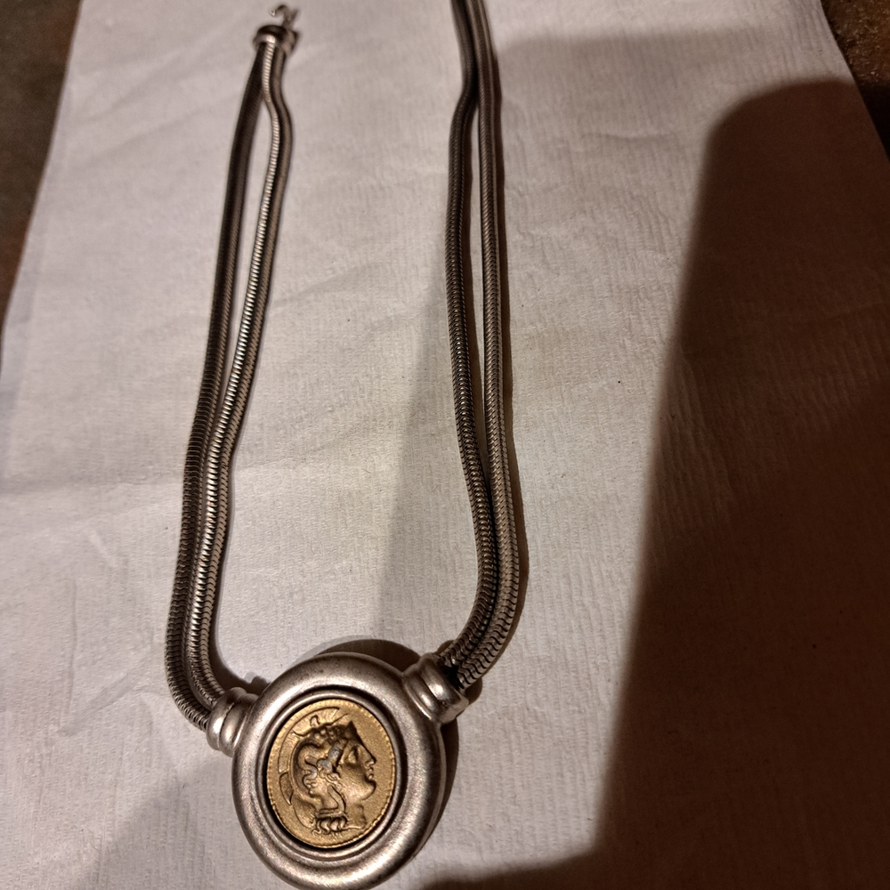 Elegant Silver and Gold Pendant Necklace